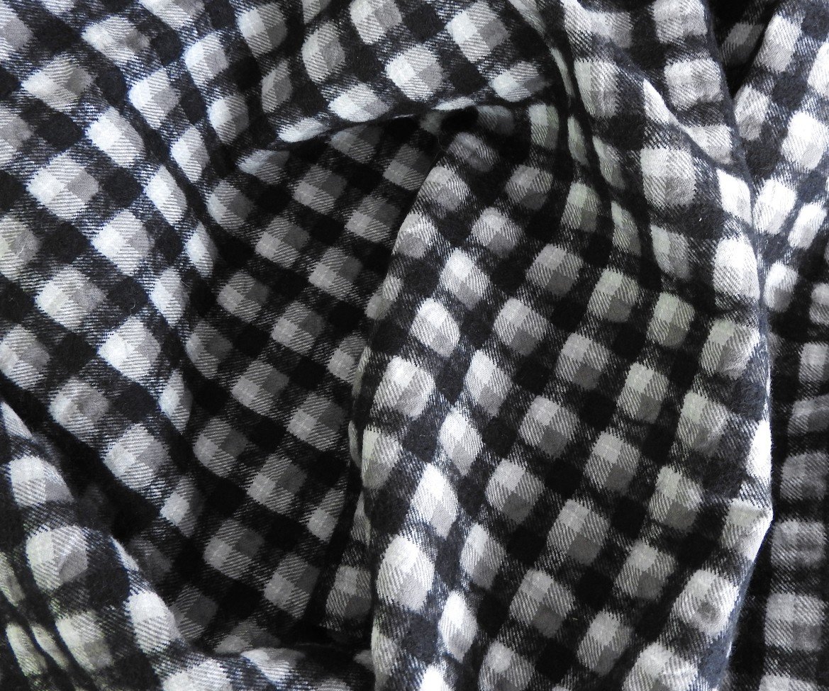 Tissus ecossais noir et gris cloqué