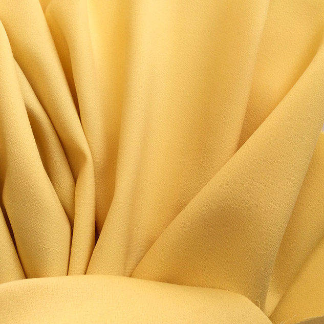 Tissu de laine crêpe envers satin jaune