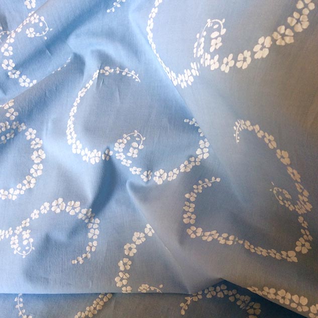 Tissu coton bleu à petites fleurs