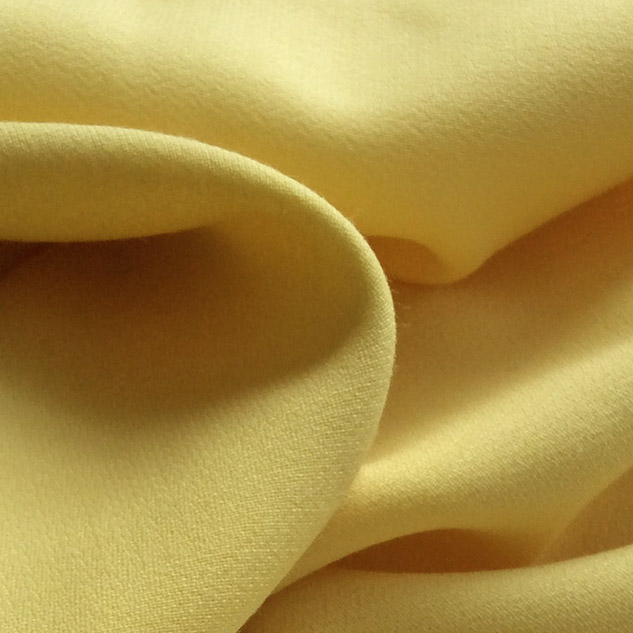 Tissu de laine crêpe jaune