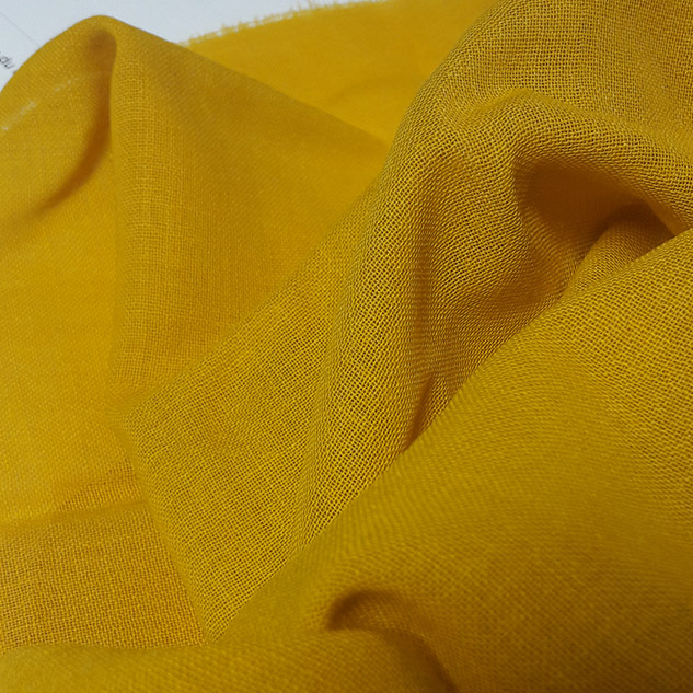 Tissu laine toile voilage jaune